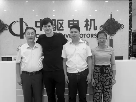 Bennett Harris with the China Drive Motors team at their reception