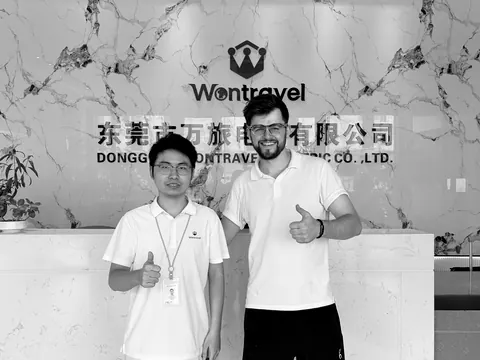 Bennett Harris with a Wontravel colleague in Dongguan, August 2026